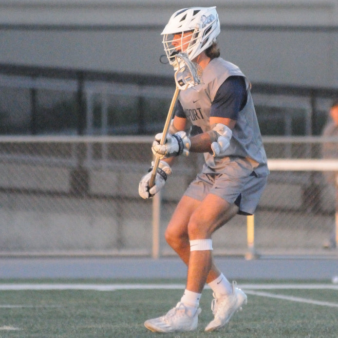 Lacrosse player defending his zone